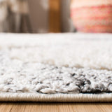 Safavieh Moroccan Tassel Shag 4'-0" x 6'-0" Rug in Grey / Ivory