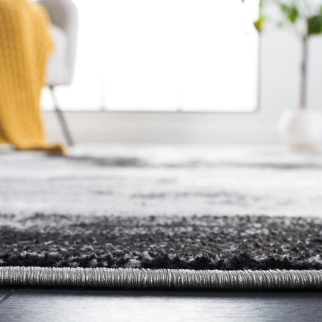 Safavieh Jasper 100 4'-0" x 6'-0" Rug in Black / Ivory