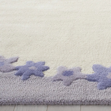 Safavieh Safavieh Kids 5'-0" x 8'-0" Rug in Ivory / Lavander