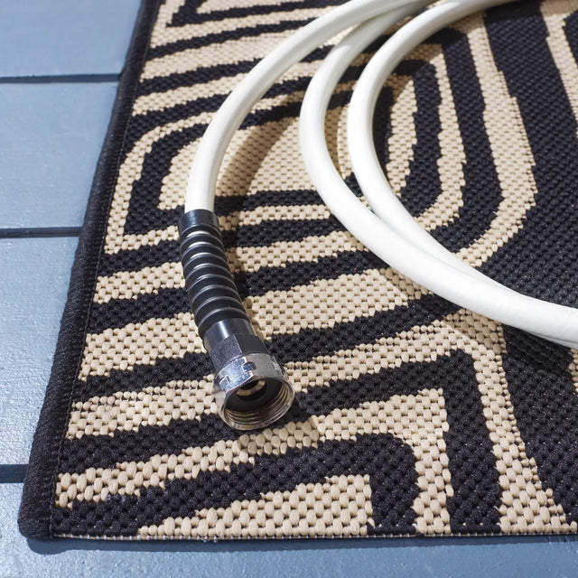 Safavieh Courtyard 5'-3" x 7'-7" Rug in Black / Beige