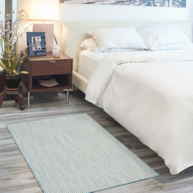 Nourison Courtyard COU01 Machine Made Ivory, Aqua Rug