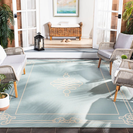 Safavieh Courtyard 6'-7" x 9'-6" Rug in Aqua / Cream