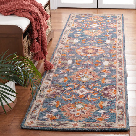 Safavieh Aspen 2'-3" x 9'-0" Rug in Blue / Rust