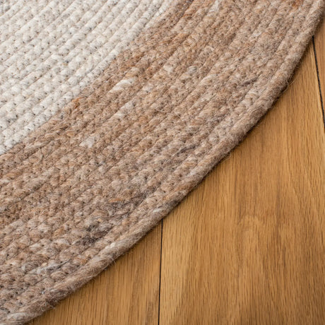 Safavieh Braided 5'-0" x 7'-0" Rug in Beige / Ivory
