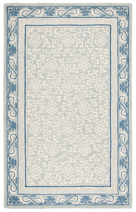Safavieh Antiquity 4'-0" x 6'-0" Rug in Light Blue / Ivory