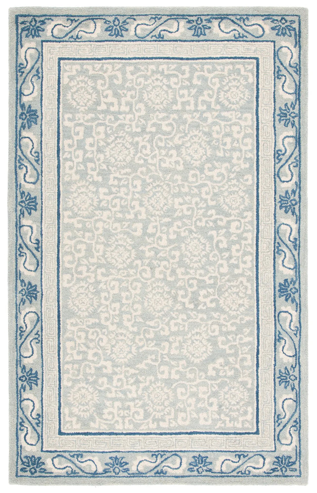Safavieh Antiquity 4'-0" x 6'-0" Rug in Light Blue / Ivory
