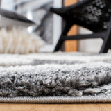 Safavieh Moroccan Tassel Shag 4'-0" x 6'-0" Rug in Grey / Ivory