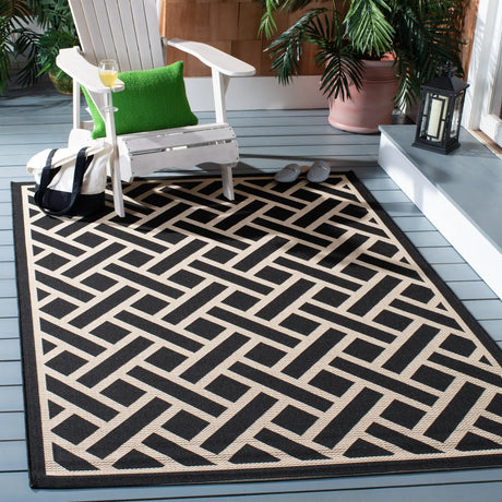 Safavieh Courtyard 5'-3" x 7'-7" Rug in Black / Light Beige