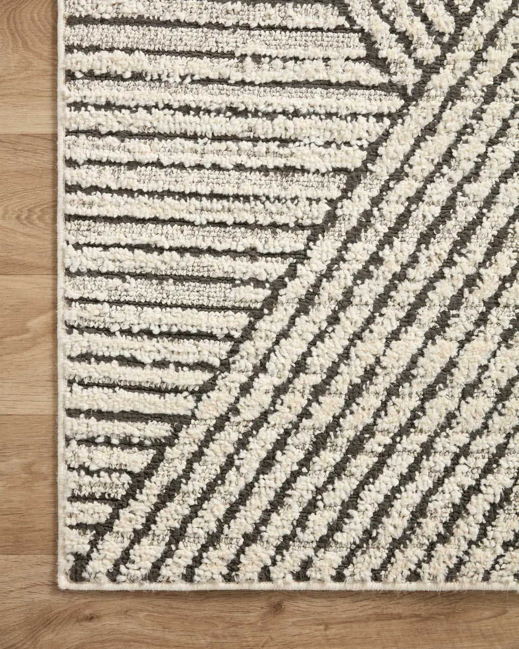 Loloi Fabian Fab-06 Charcoal/Ivory Rug - corner on wood
