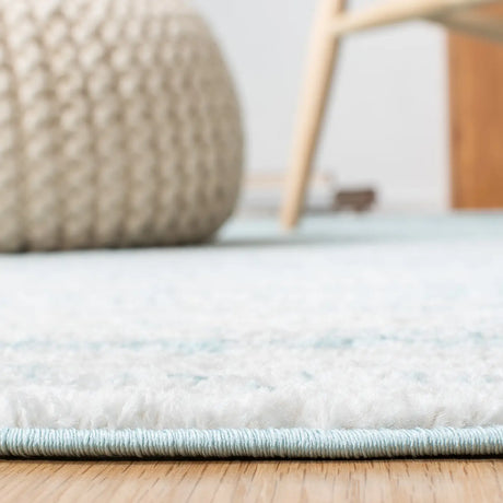 Safavieh Adirondack 4'-5" x 6'-5" Rug in Aqua / Ivory