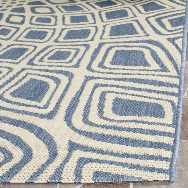 Safavieh Courtyard 5'-3" x 7'-7" Rug in Blue / Beige