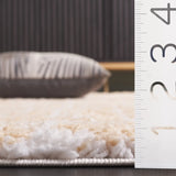 Safavieh Rumi Shag 4'-0" x 6'-0" Rug in Gold / Ivory