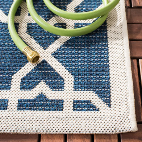 Safavieh Courtyard 5'-3" x 7'-7" Rug in Navy / Beige