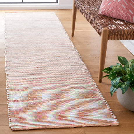Safavieh Montauk 2'-3" x 9'-0" Rug in Red / Ivory
