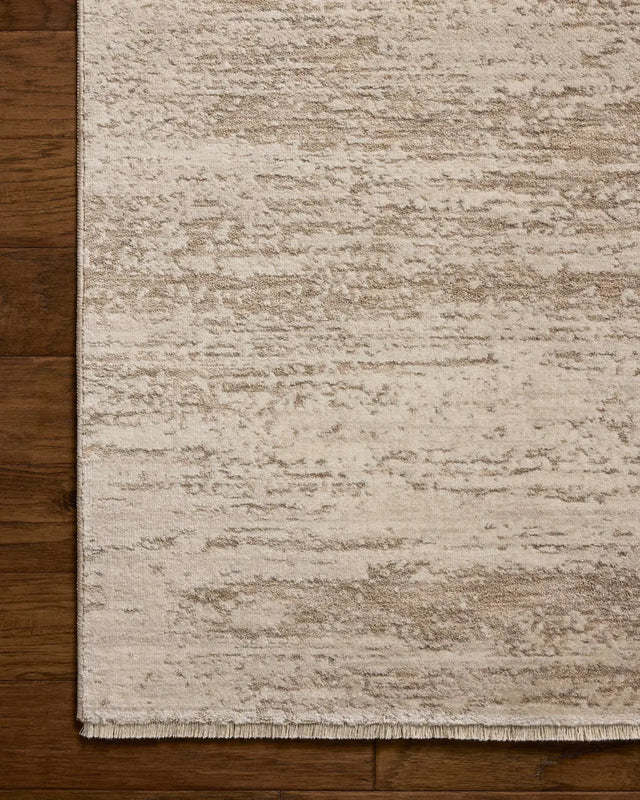 Loloi Nellie NEL-04 Ivory / Pebble Rug - corner on wood