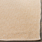 Safavieh Montauk 4'-0" x 6'-0" Rug in Ivory / Rust