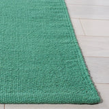 Safavieh Montauk 4'-0" x 6'-0" Rug in Dark Green / Ivory