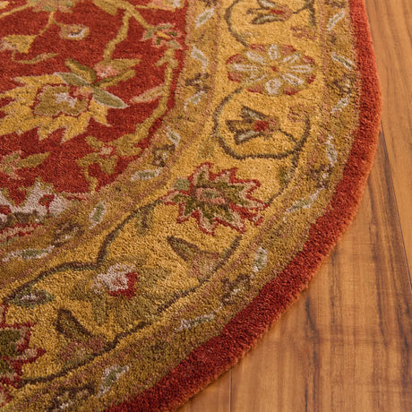 Safavieh Antiquity 4'-6" x 6'-6" Rug in Rust / Gold