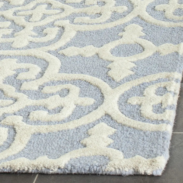 Safavieh Cambridge 2'-6" x 10'-0" Rug in Light Blue / Ivory