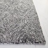 Safavieh Micro-Loop 5'-0" x 8'-0" Rug in Black / Ivory