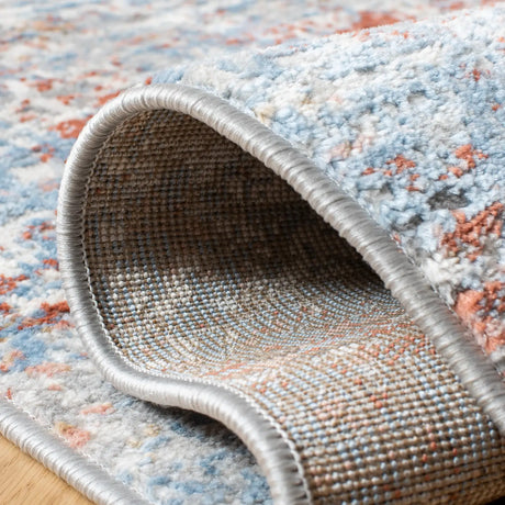 Safavieh Amelia 4'-5" x 6'-5" Rug in Ivory / Rust