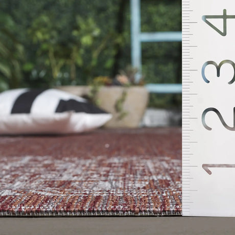 Safavieh Courtyard 5'-3" x 7'-7" Rug in Red / Beige