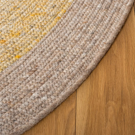 Safavieh Braided 5'-0" x 7'-0" Rug in Gold / Beige