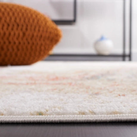 Safavieh Phoenix 500 4'-5" x 6'-5" Rug in Ivory / Gold Rust