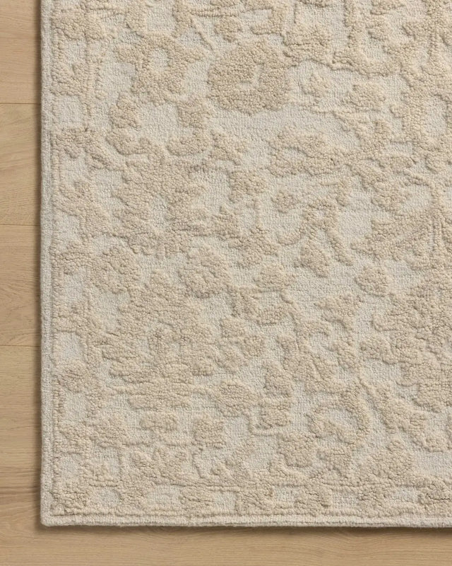 Loloi Prudence PRU-01 Cream / Ivory Hand Tufted Rug - corner on wood