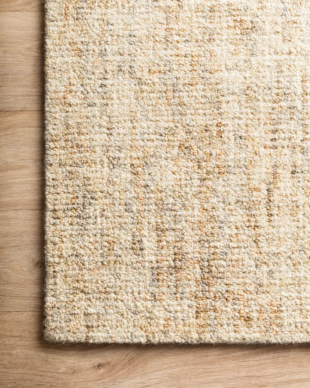 Loloi Harlow Hlo-01 Sand/Stone Rugs - corner on wood