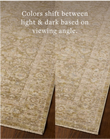 Loloi Elora ELR-05 Traditional Power Loomed Moss, Clay Rug - angled corner on wood