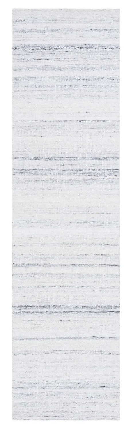Safavieh Outdoor Micro-Loop 2'-3" x 9'-0" Rug in Ivory