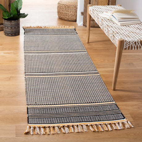 Safavieh Montauk 2'-3" x 7'-0" Rug in Gold / Multi