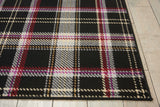 Rectangle black plaid area rug with cream, red, purple, and gold check lines