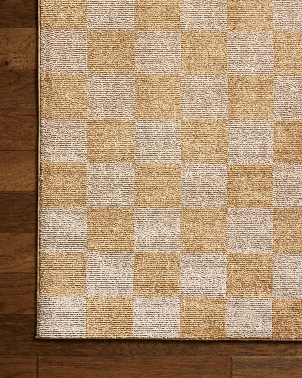 Chris Loves Julia x Loloi Calvin CLV-01 Apricot / Ivory Rug - corner on wood