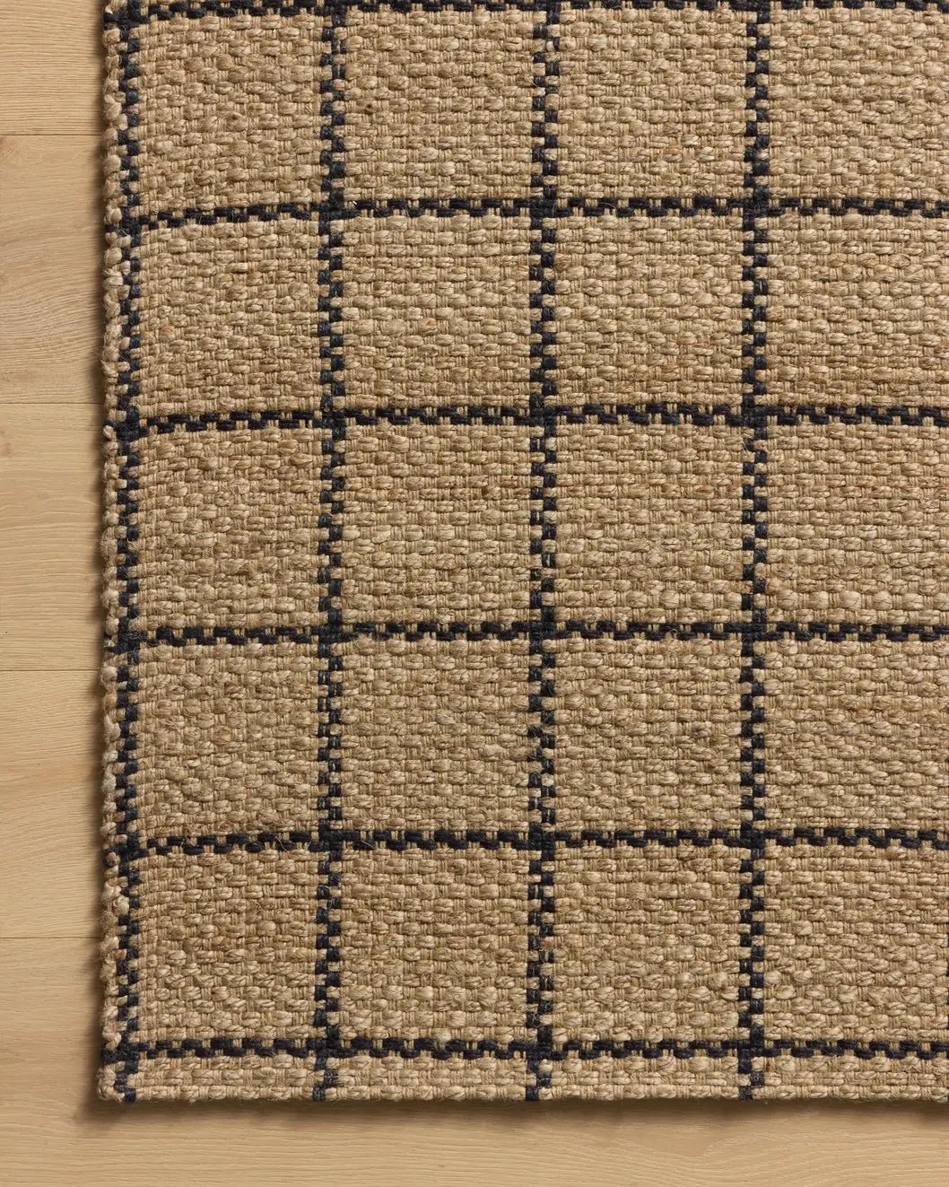 Chris Loves Julia x Loloi Fletcher FLE-01 Natural / Black Rug - corner on wood