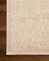 Chris Loves Julia x Loloi Palma PLM-01 Ivory / Sand Rug - corner on wood