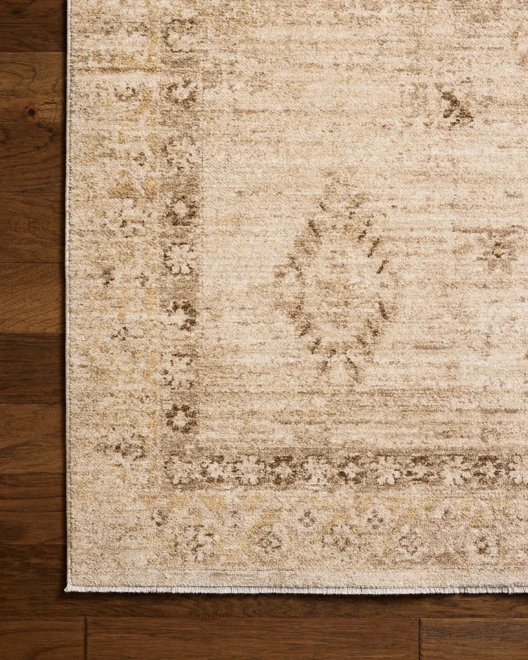 Chris Loves Julia x Loloi Palma PLM-06 Natural / Smoke Rug - corner on wood