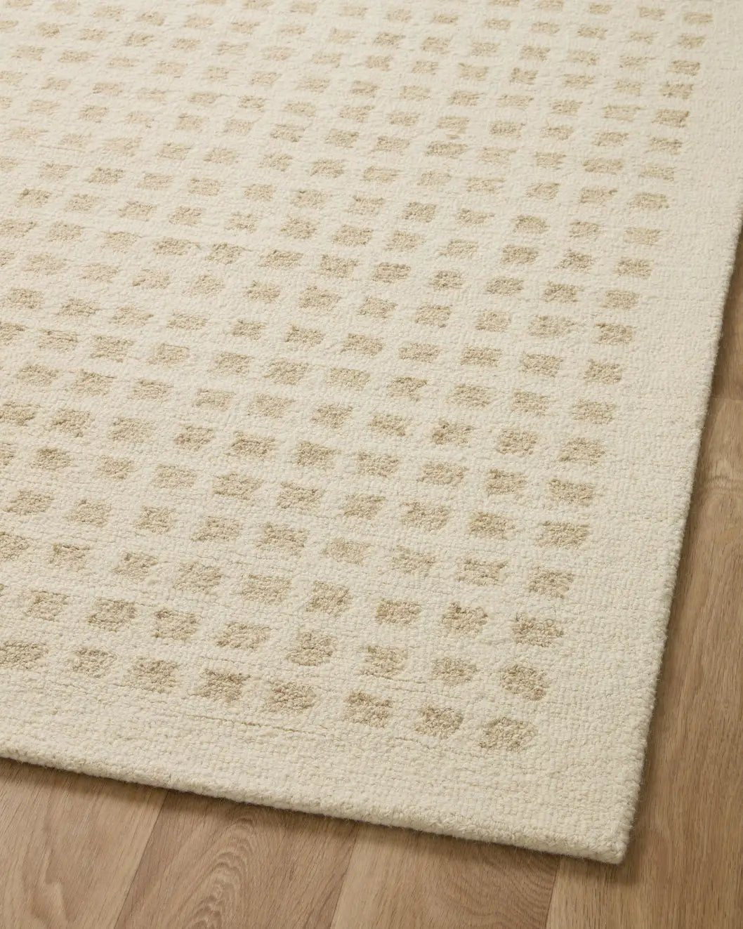 Chris Loves Julia x Loloi Polly POL-01 Ivory / Natural Rug - angled corner on wood