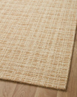 Chris Loves Julia x Loloi Polly POL-03 Straw / Ivory Rug - angled corner on wood