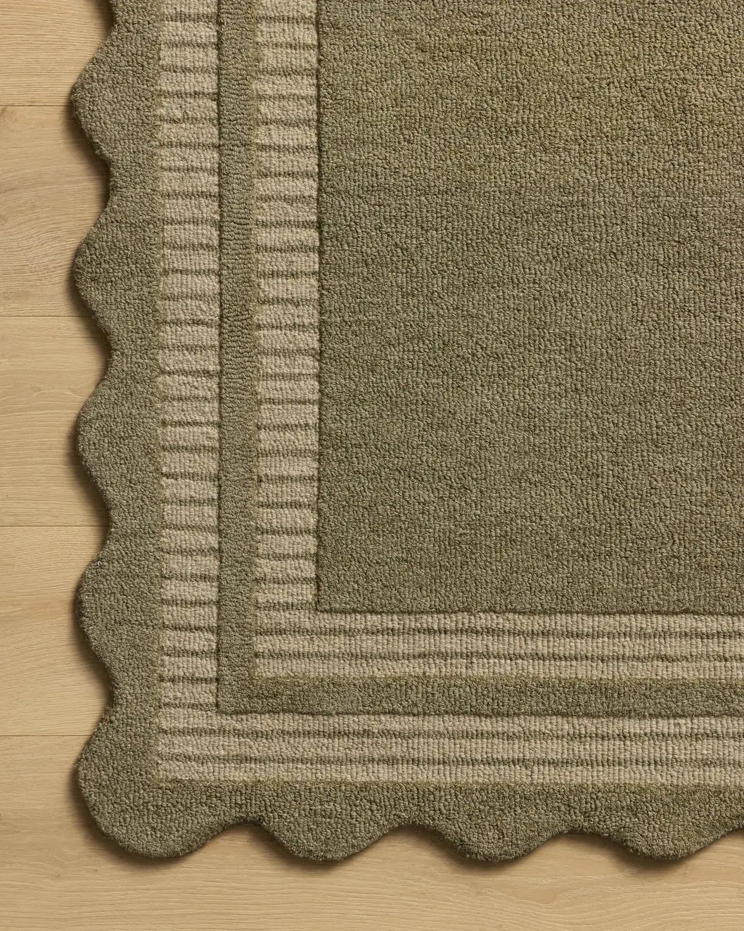 Chris Loves Julia x Loloi Scottie SCO-01 Olive / Pebble Rug - corner on wood