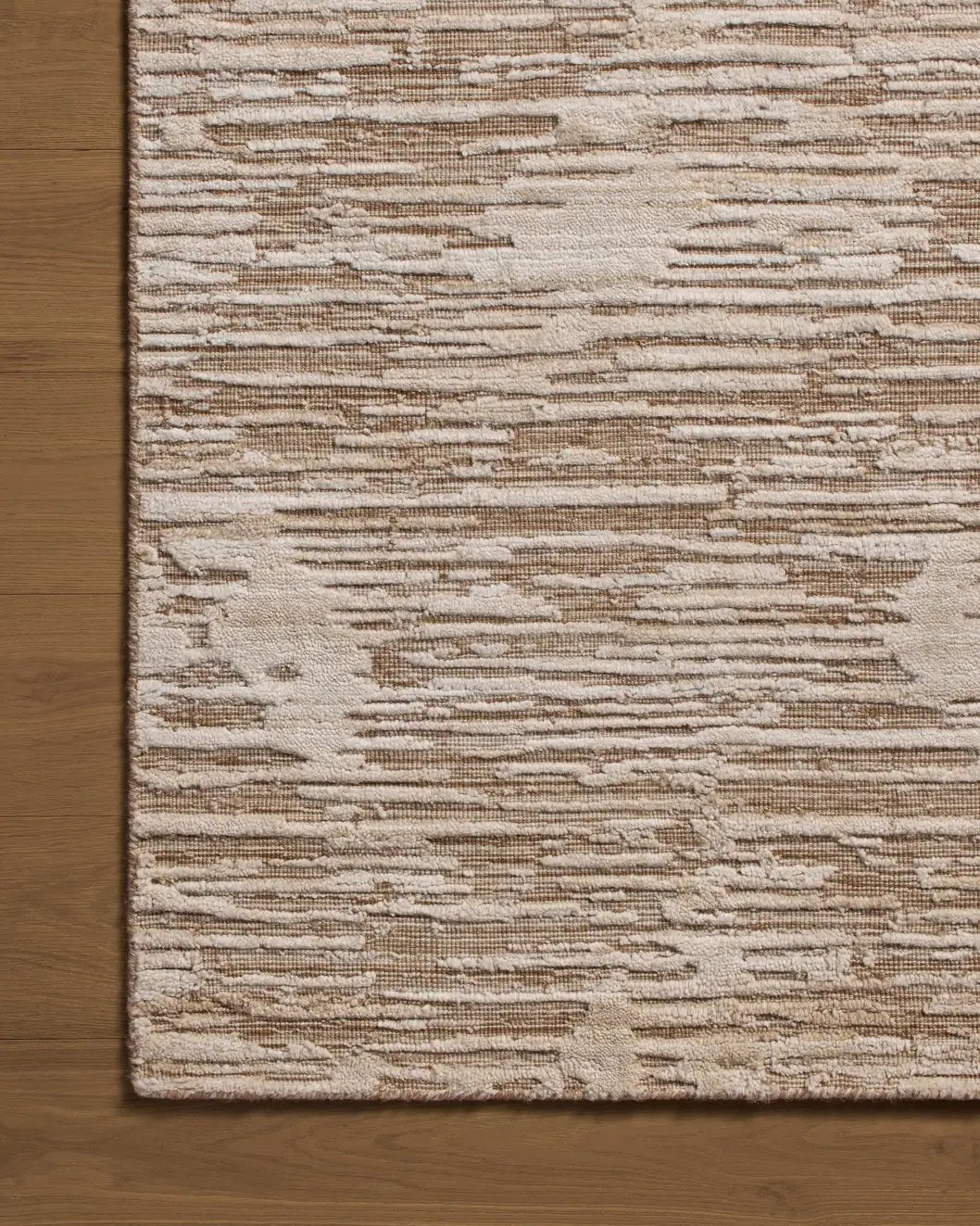 Jean Stoffer x Loloi Daniel DAN-02 Natural Rug - corner on wood