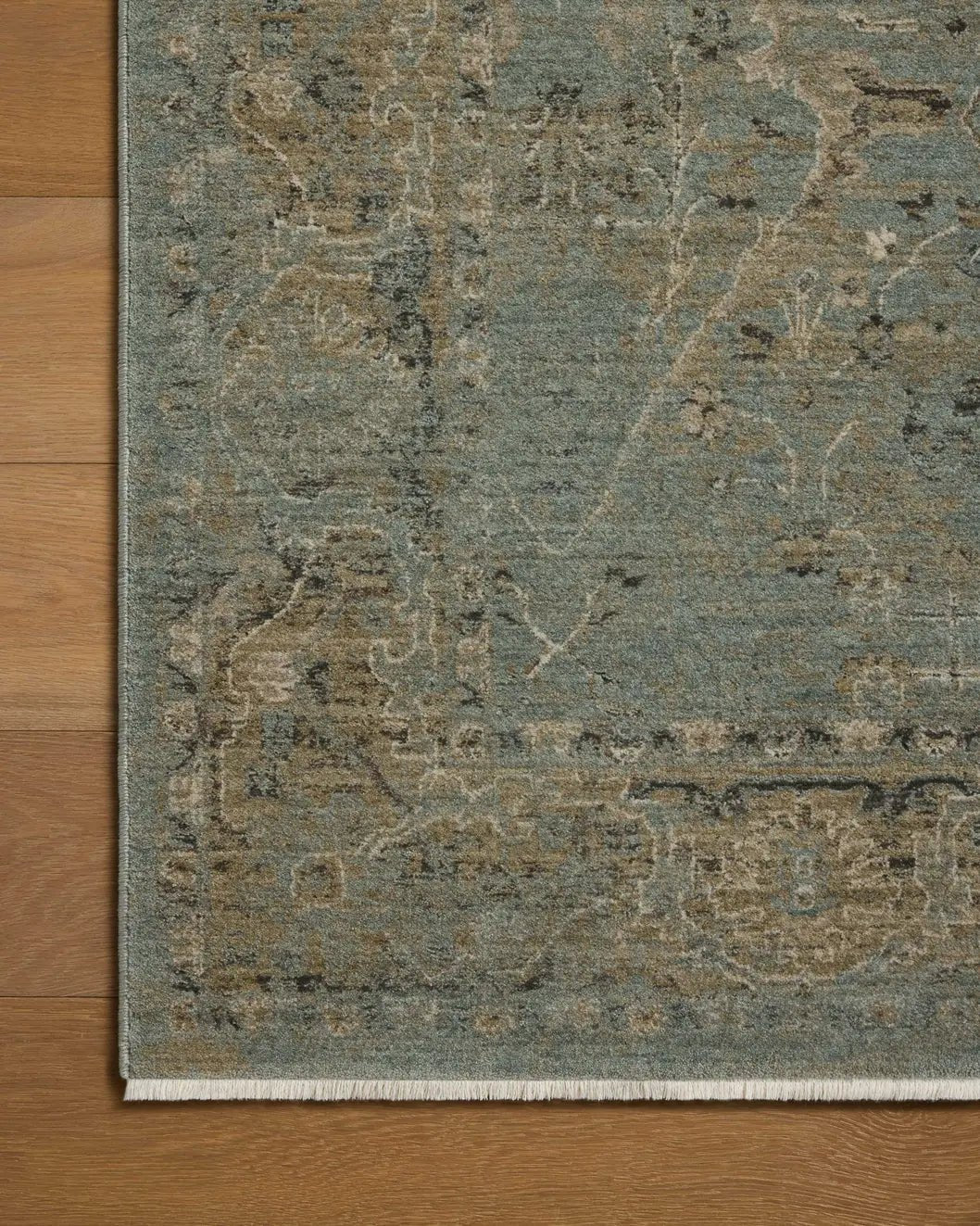 Loloi Briar BRR-02 Aqua / Olive Rug - corner on wood