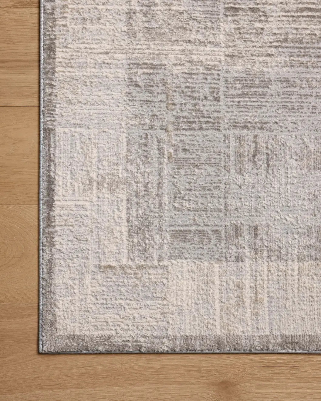 Loloi Hollis HOL-04 Smoke / Mist Rug - corner on wood