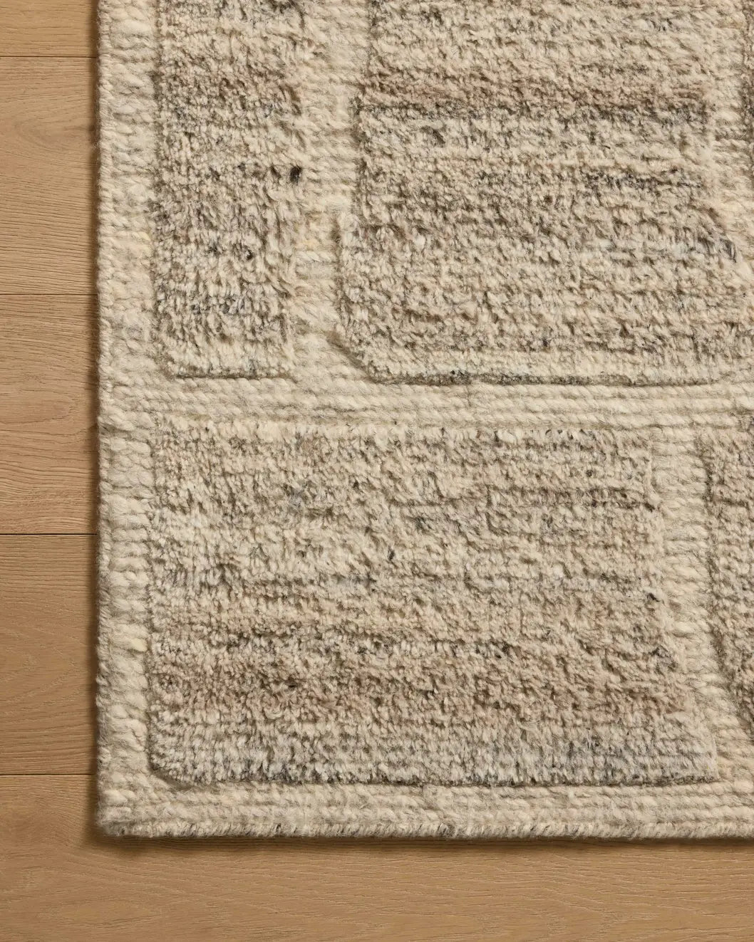 Loloi Hughes HUS-01 Dove Rug - corner on wood