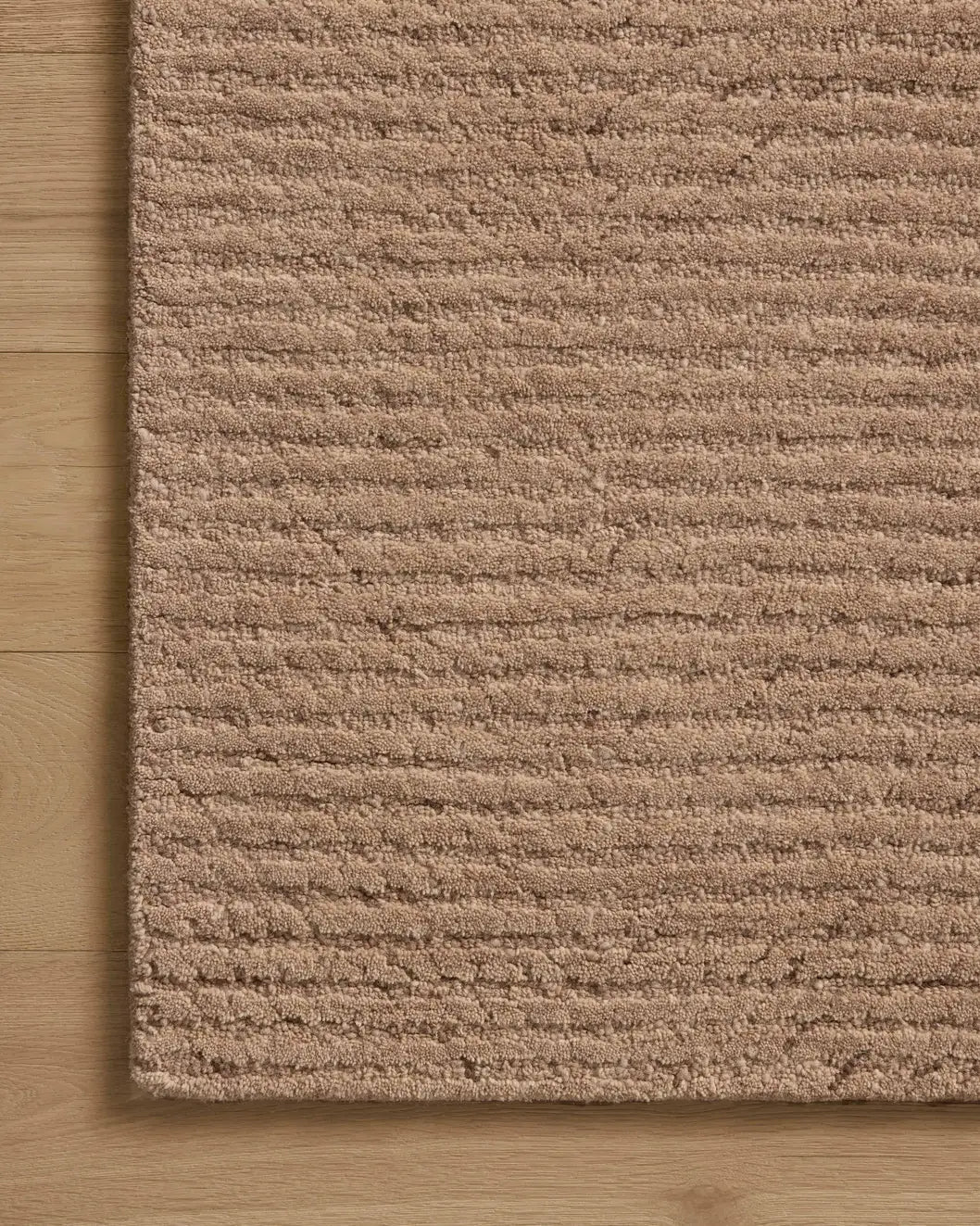 Loloi Kai KAI-01 Blush Rug - corner on wood