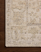 Loloi Milena MLE-08 Ivory / Sand Rug - corner on wood