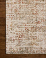 Loloi Nellie NEL-02 Natural / Sunset Rug - corner on wood