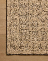 Loloi Novi NVI-01 Tan / Onyx Rug - corner on wood