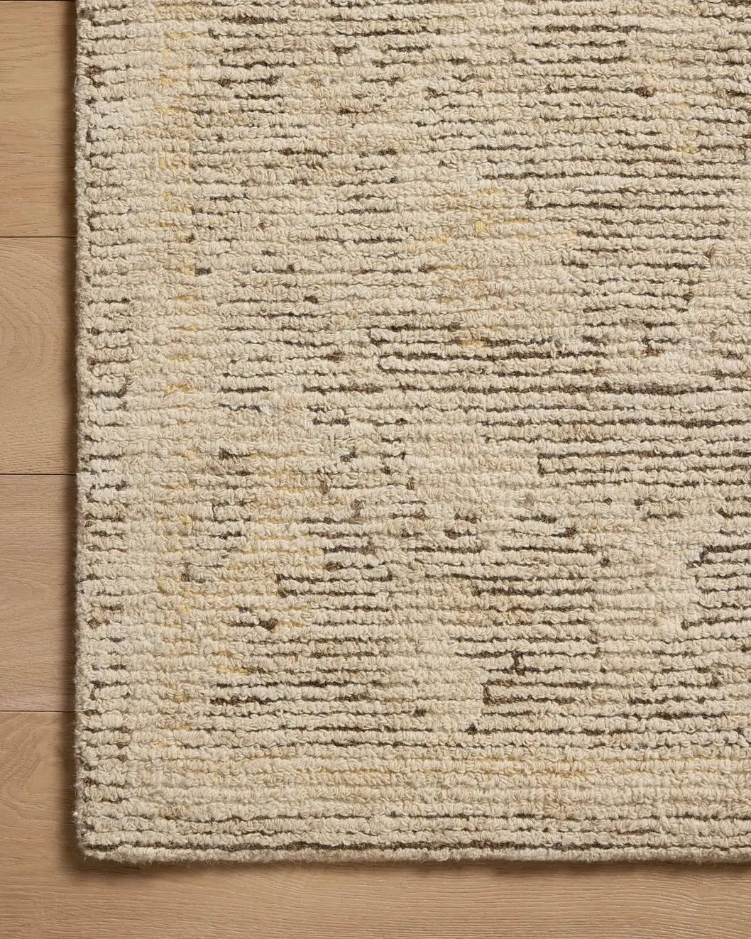Loloi Penny PEN-02 Coffee / Natural Rug - corner on wood